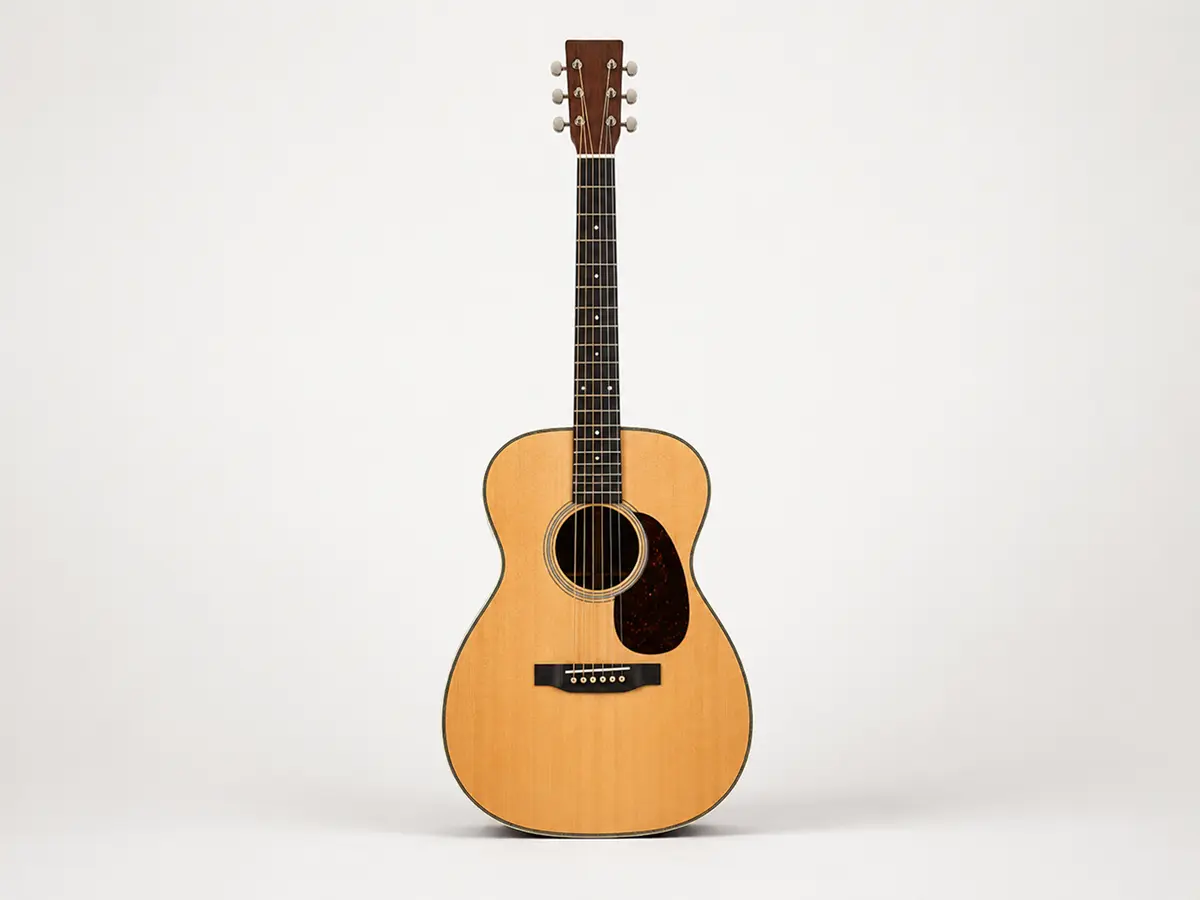 Full body shot of an Orchestra Model (OM) acoustic guitar — smaller, balanced body